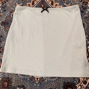 Used Princess Polly Light Blue mini skirt with mini bow Medium 38 us 6